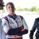 Ed Carpenter (left) speaks with Simona de Silvestro (center) and Beth Paretta (right) at the 2022 Honda Indy 200.